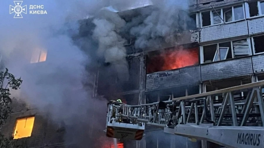 Two people killed and eight injured, including four children, in Russian attack on Kyiv – photos