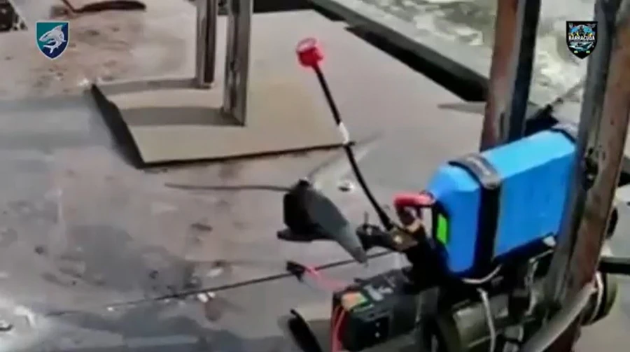 Ukrainian forces use unmanned boat to deliver FPV drones to strike Russian vessel – video