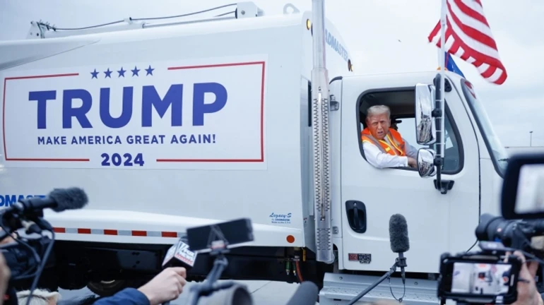 Trump dresses up as refuse collector to criticise Biden's remarks