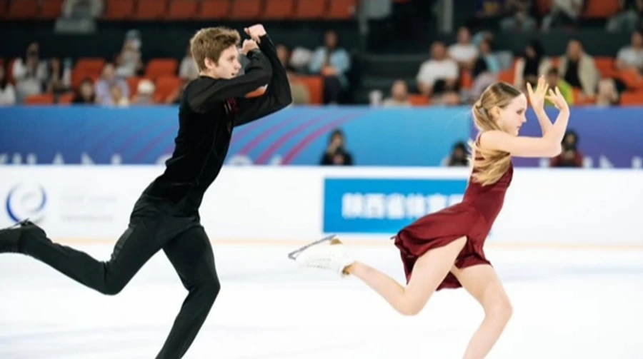 Russian figure skaters perform to Ukrainian Shchedryk christmas carol at Grand Prix in China – video