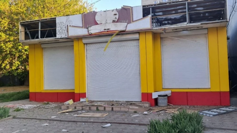 Russians attack Nikopol: shops, a sports club and two high-rise buildings damaged – photos