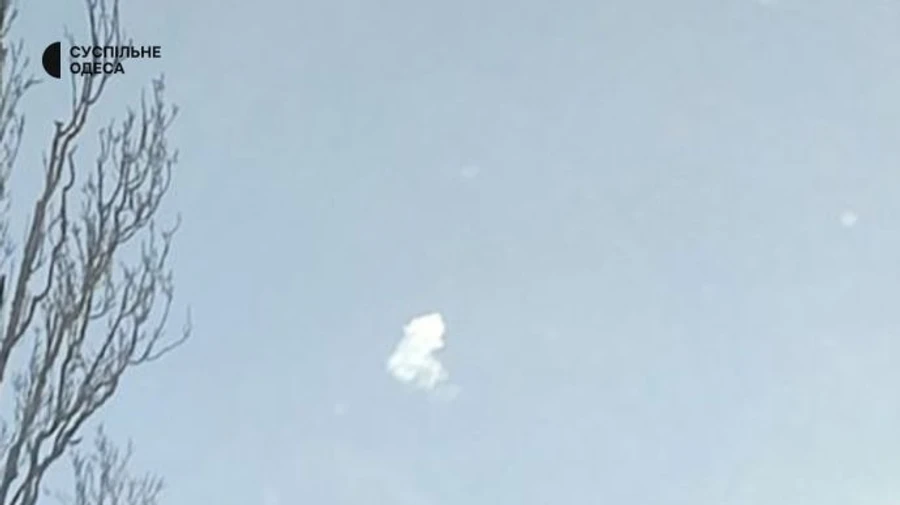 Explosions rock Odesa, traces of air defence system operation visible above city, debris falls on house