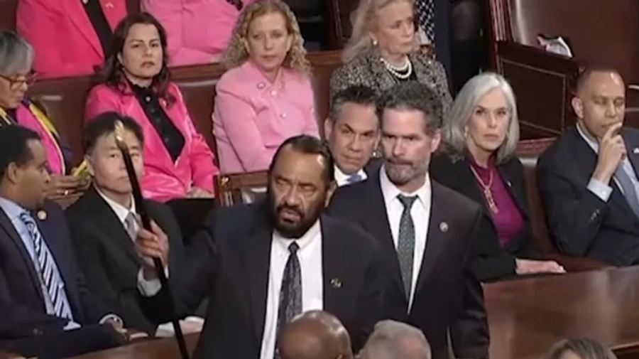 Democratic congressmen protest and demonstrate support for Ukraine during Trump's speech
