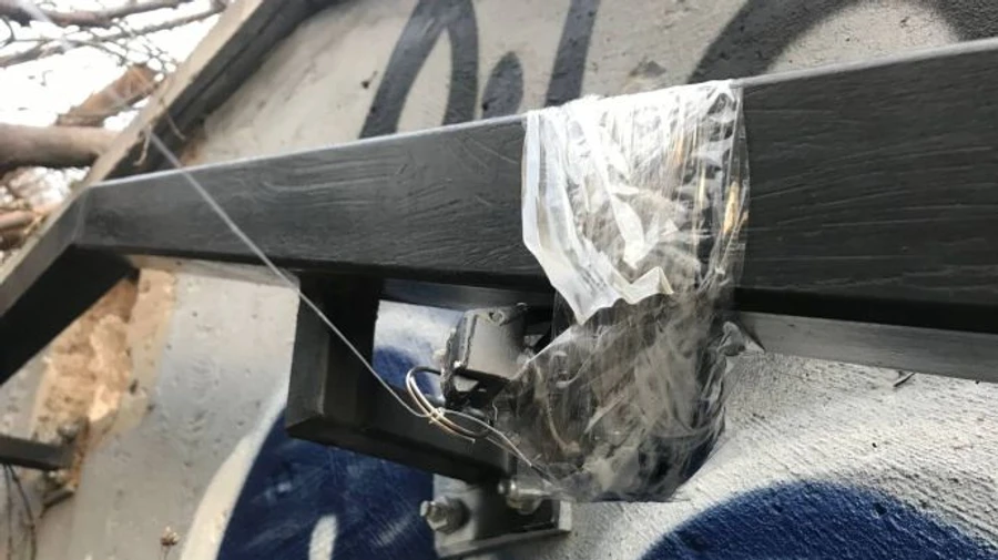 Booby trap found inside a pile of twigs in Kyiv