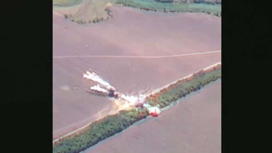 Ukrainian intelligence troops destroy Russian Buk-M1 anti-aircraft missile system with ammunition load – video