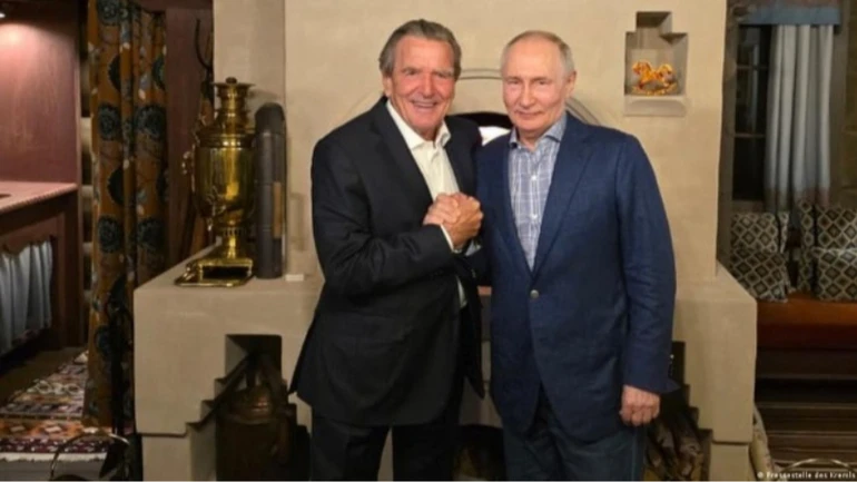 Putin celebrates birthday with former German chancellor Schröder