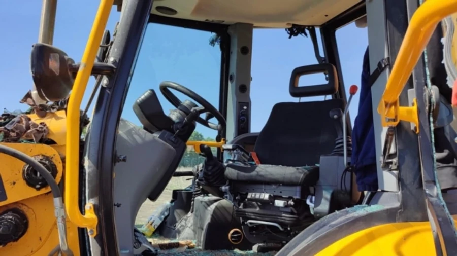 Russian drone strikes tractor in Kharkiv Oblast, driver suffers contusion – photo