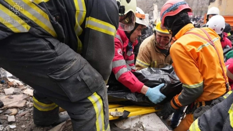 Odesa authorities say 11 more people, including children, may be trapped under rubble after Russian attack