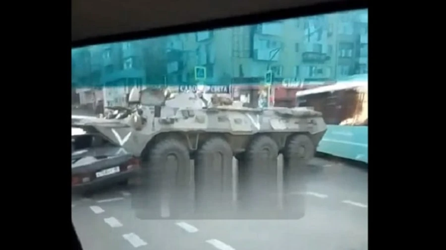 Russian armoured personnel carrier runs into civilian car in occupied Luhansk