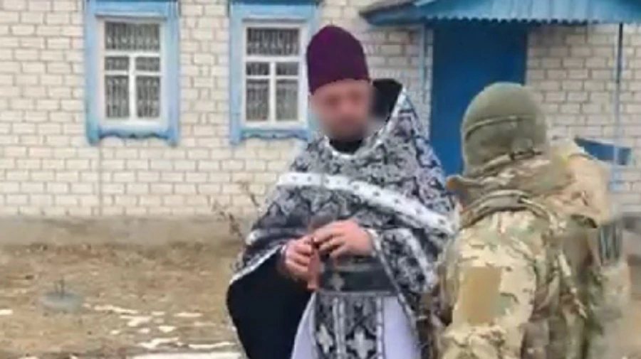 Clergyman of Moscow-linked church sentenced to 15 years in prison for treason