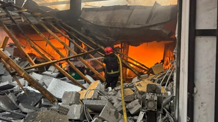 Russians hit business in Chuhuiv in Kharkiv Oblast, causing casualties – photos