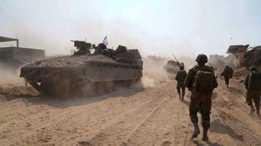 IDF reports it completely encircled city of Gaza and splits enclave in two