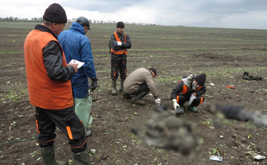 Красный Крест поможет идентифицировать погибших на Донбассе