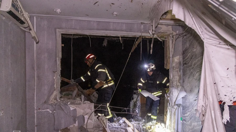 Eight people injured as Russian missile hits residential building in Kharkiv – photos