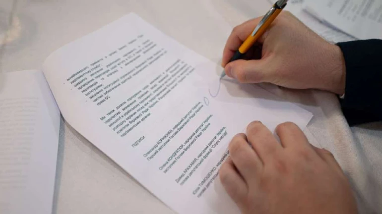 Ukraine's political parties agree to postpone elections until after the war 