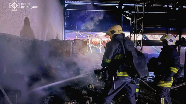 Russians attack Kyiv Oblast with drones: production plant and warehouses burned down, houses damaged – photos