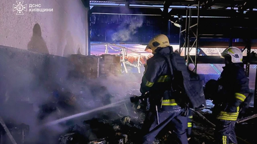 Russians attack Kyiv Oblast with drones: production plant and warehouses burned down, houses damaged – photos