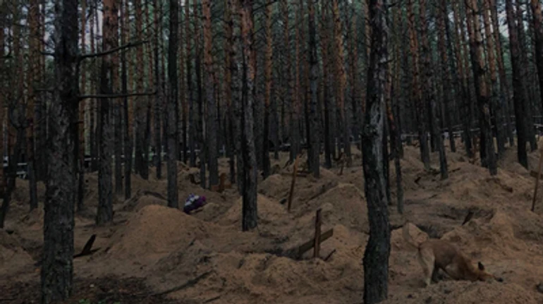 A wedding dress was placed in her coffin: The story of a family wiped out in Izium and the year-long wait to rebury their bodies