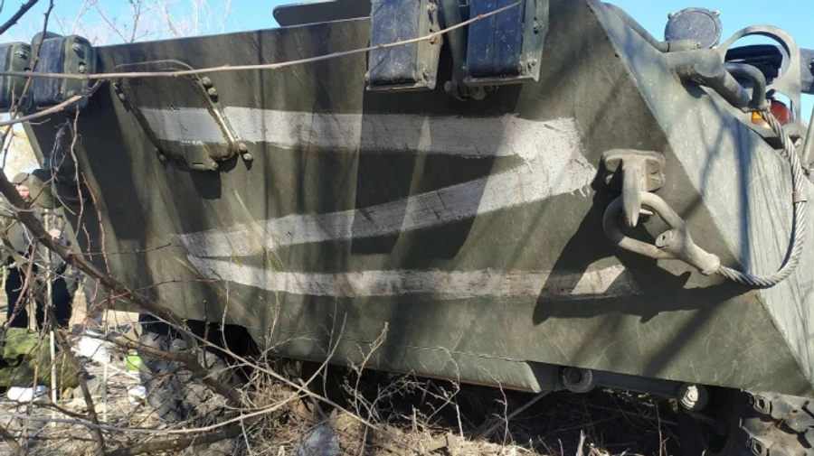 Ukrainian soldiers damaged Russian armoured vehicle carrying stolen laptops and money