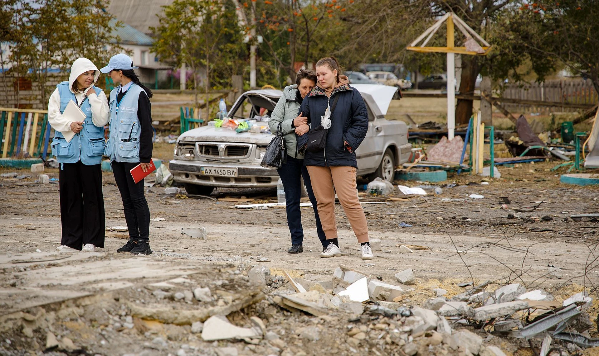 There's a child in the morgue. We don't know if it's ours. How the village of Hroza is coping after the mass killing, as it prepares for the victims' funerals