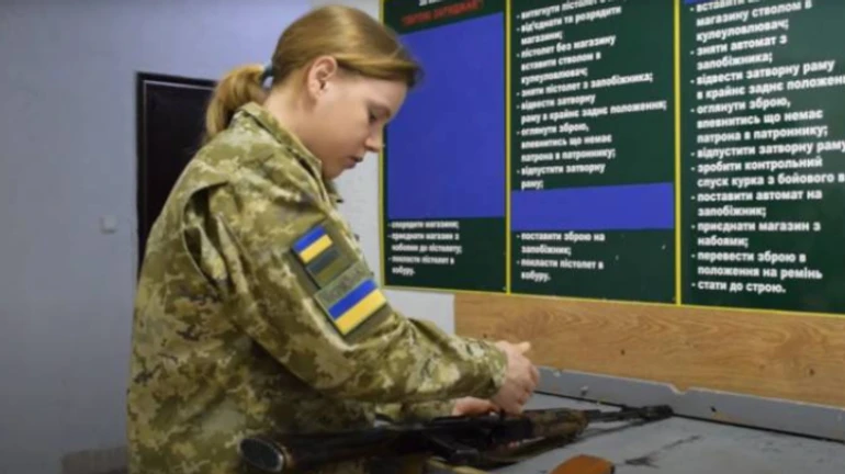 Olympic athlete exchanges biathlon rifle for assault rifle and goes to defend Ukraine