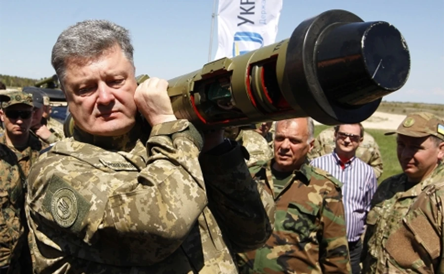 После заявления Макрона и Меркель Порошенко дал поручение армии