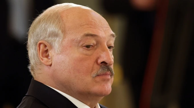 Lukashenko's dog urinates at polling station as Belarusian leader arrives to vote – video