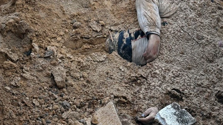 У Бузовій під Києвом виявили могилу із загиблими українцями – британська розвідка