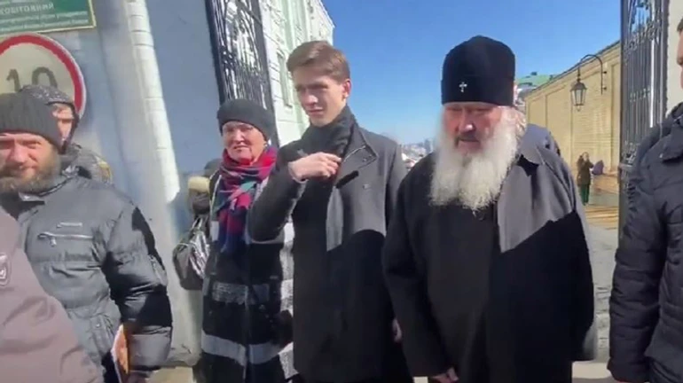 Abbot of Kyiv's Caves Monastery threatens journalists with violence, damages reporter's camera