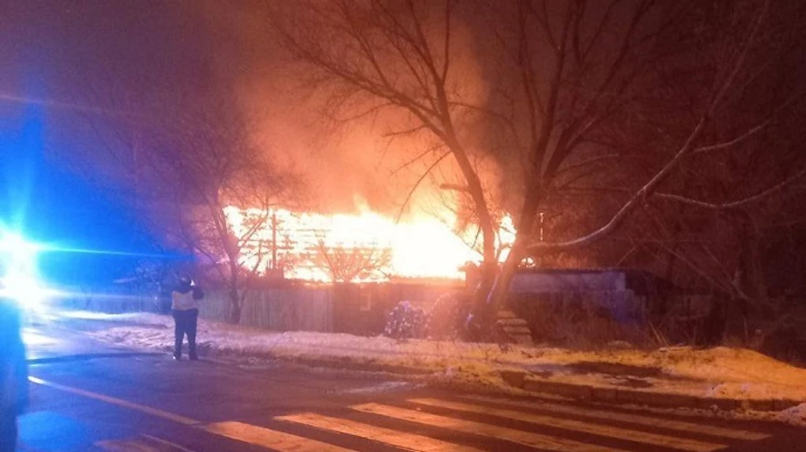 Houses and cars on fire and casualties recorded after missile attack in Kyiv