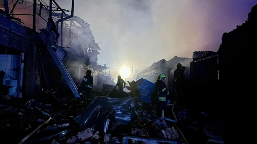 Authorities say Russian drone attack damaged apartment blocks, school and cars in Bila Tserkva – photos