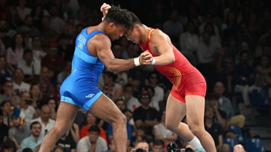 Ukraine's Zhan Beleniuk reaches Greco-Roman wrestling quarter-finals at 2024 Olympics