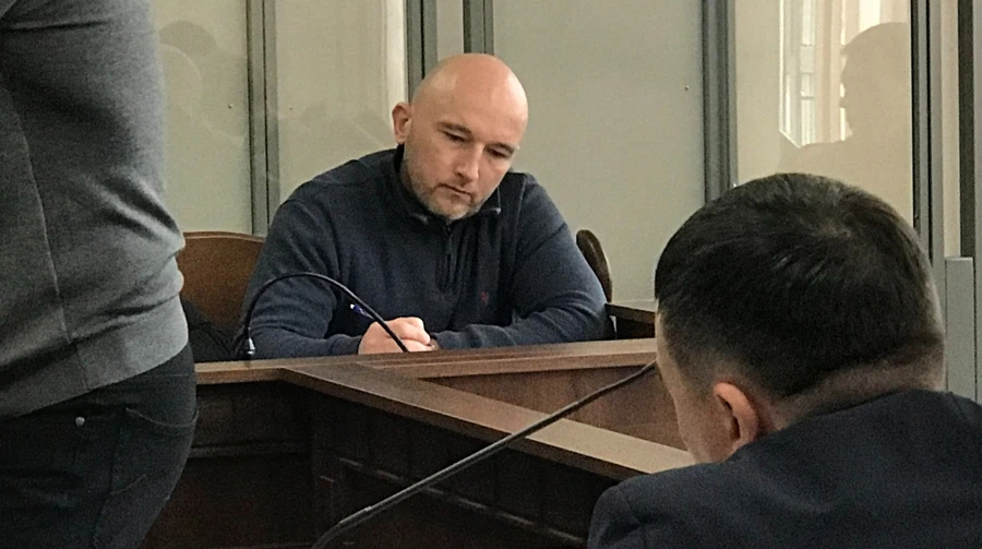 Кірпіч, лисий директор та інші: ДБР оприлюднило деталі схеми захоплення квартир померлих за участі Тандира