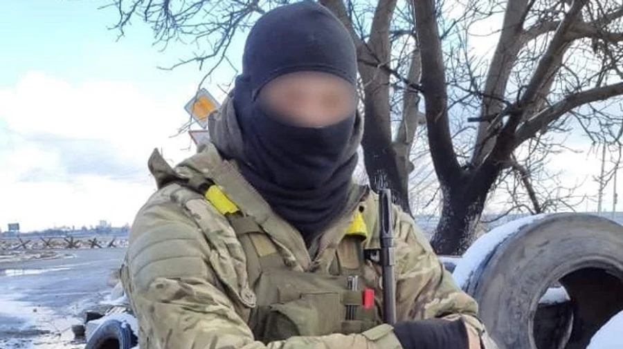 A member of the National Guard has shot a Russian sniper using a machine-gun from more than a kilometre away in Mykolaiv