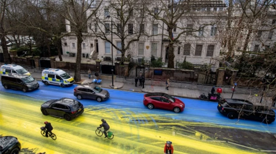 Huge Ukrainian flag painted on road near Russian embassy in London