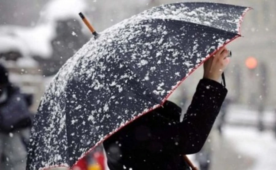 Мокрий сніг та 17 градусів тепла: погода до кінця тижня