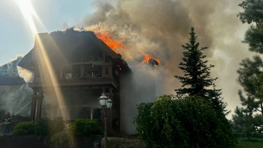 Two people injured and houses ablaze after Russian missile strike on Kharkiv Oblast – photos
