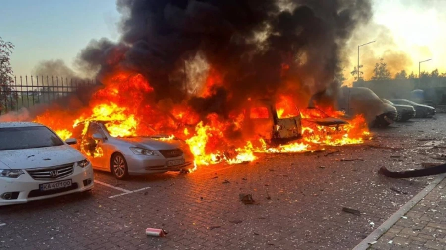 Aftermath of Russian attack on Kyiv Oblast: cars and house on fire – photos