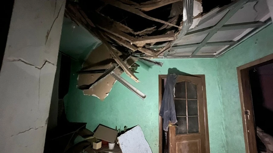 Russians bombard Nikopol district, causing much damage and wounding two people – photos