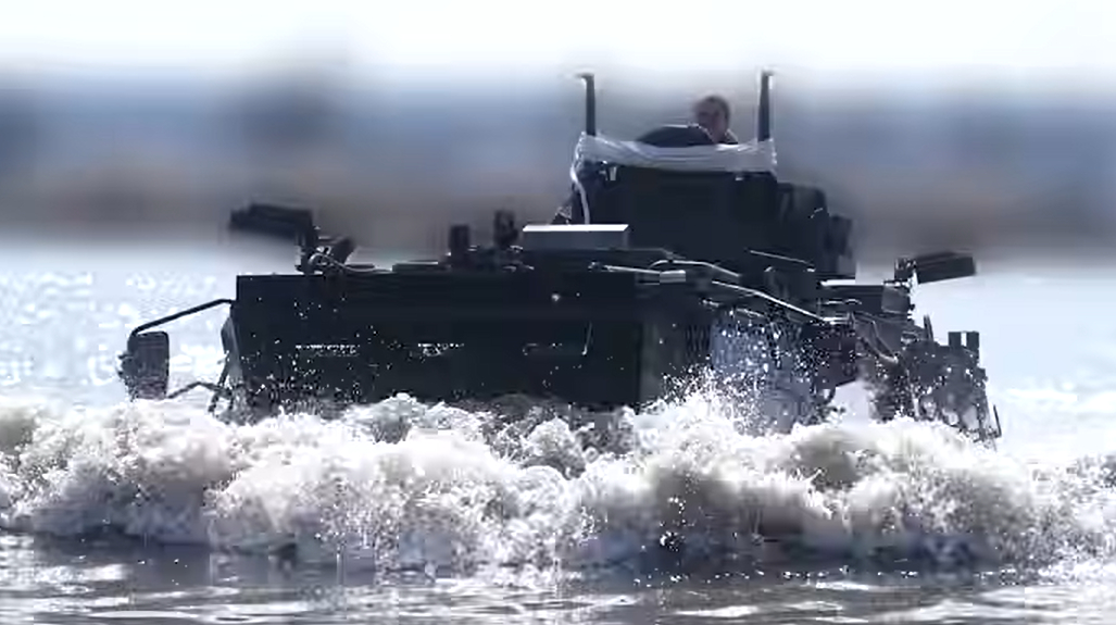 Ukrainian forces tests Finnish-made armoured vehicle on water