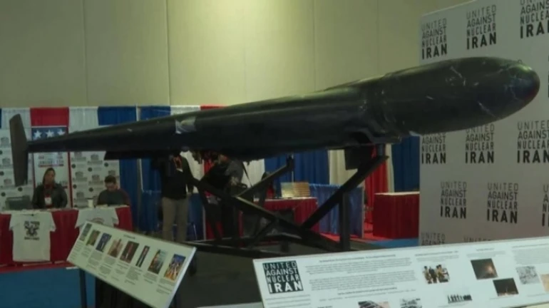 Polish minister brings Shahed drone downed in Ukraine to US – video