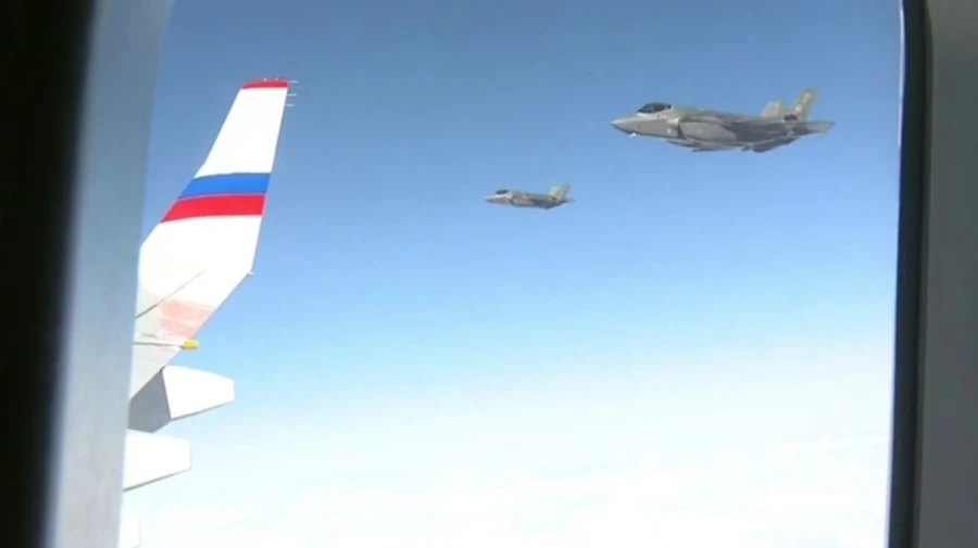 Kremlin video shows US fighter jets escorting Putin from Alaska – video