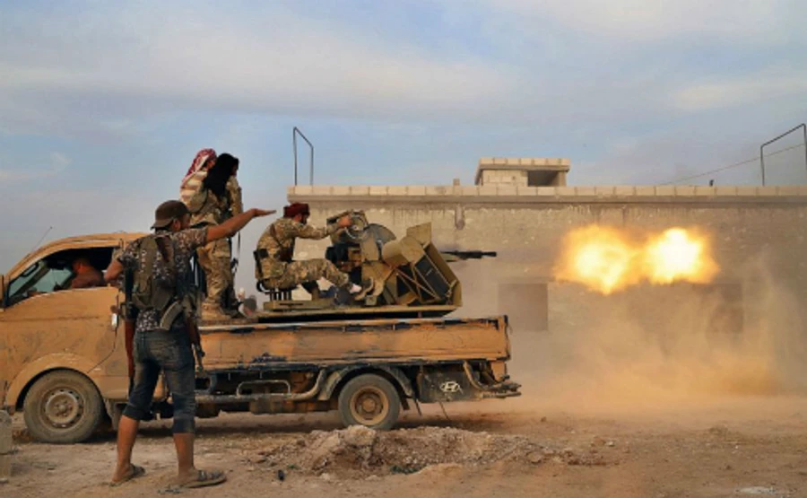 Сирія: після ударів Туреччини тривають бої за стратегічне місто