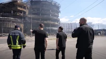 Zelenskyy visits sites damaged in Russian attack on Kyiv – video