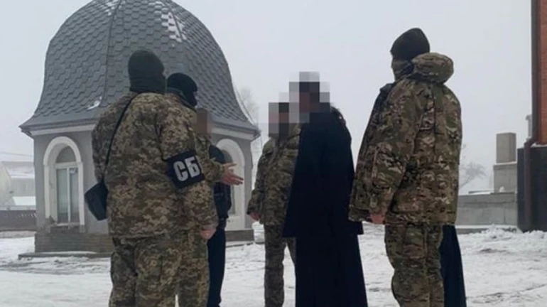 Suspicious thugs, weapons and propaganda found at Moscow-linked Orthodox Church premises