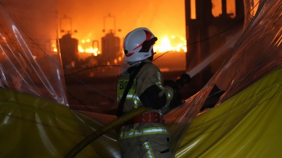 Huge fire still raging at US-owned plant in Zakarpattia Oblast after Russian strikes – photos