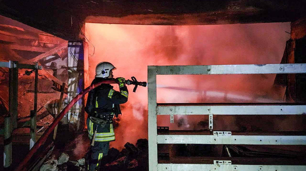 Russians strike Dnipropetrovsk and Odesa oblasts, damaging business, warehouses and petrol station, fires rage – photos