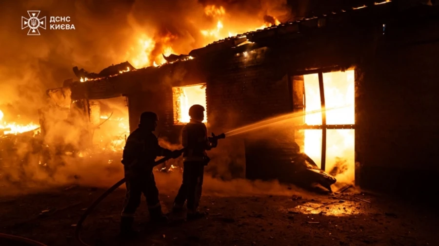 Thirty drones attack Kyiv overnight: warehouses burn, house destroyed, two people injured – photos