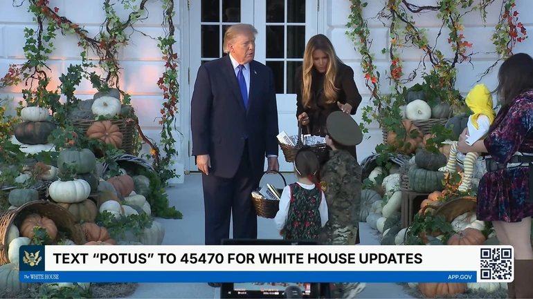 Trump greets children dressed in Russian costumes at White House Halloween event