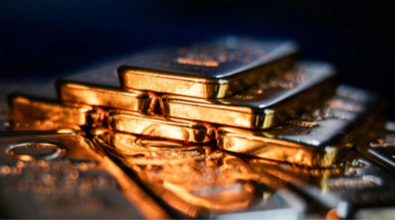 Золото впало в ціні через сильний долар та війну на Близькому Сході